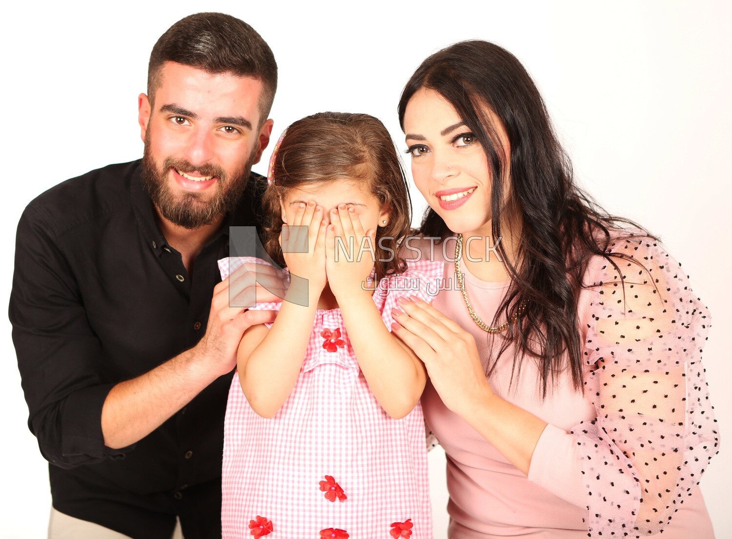 A man and a woman with their daughter