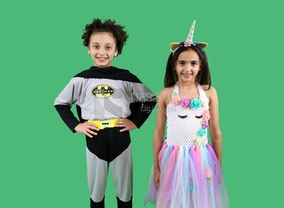 A boy and a girl wearing costumes