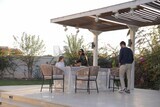 a family eating in the garden