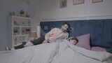 a father sitting on the bed during his boy&#39;s sleep