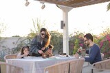 a family eating in the garden