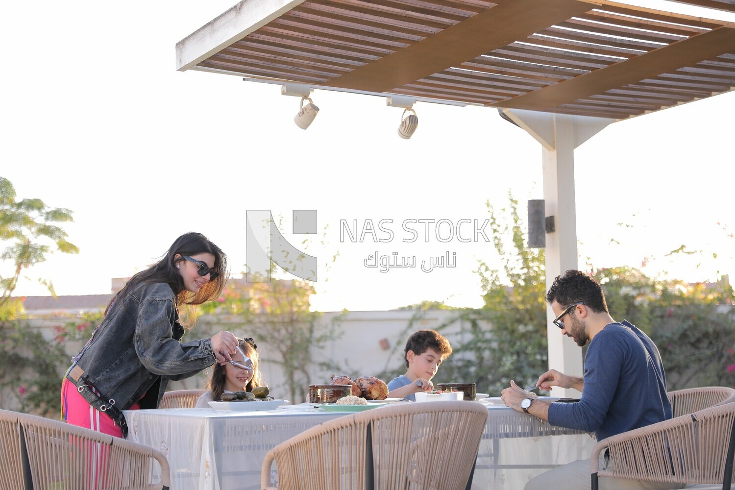 a family eating in the garden