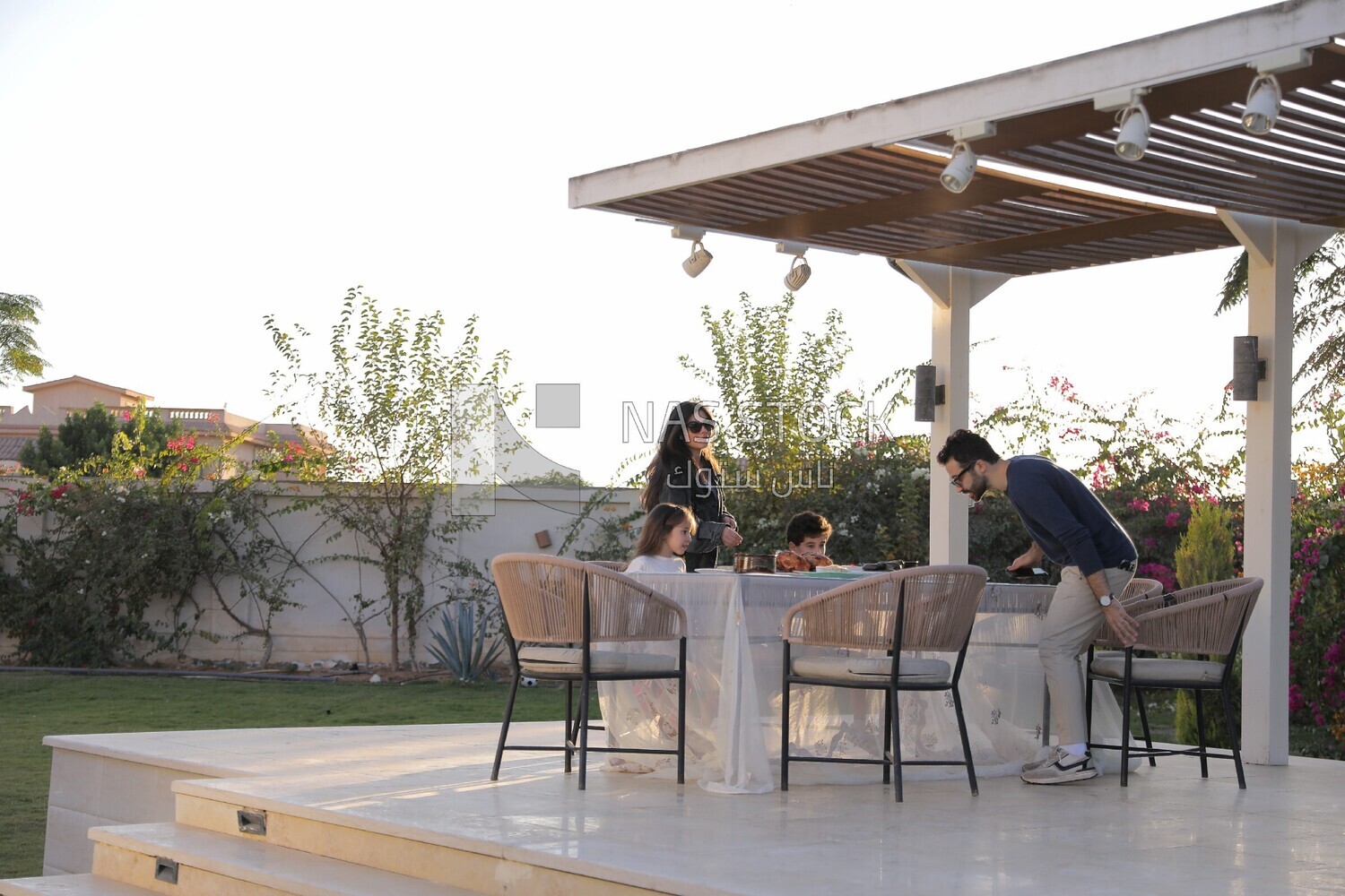 a family eating in the garden
