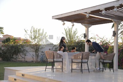 a family eating in the garden