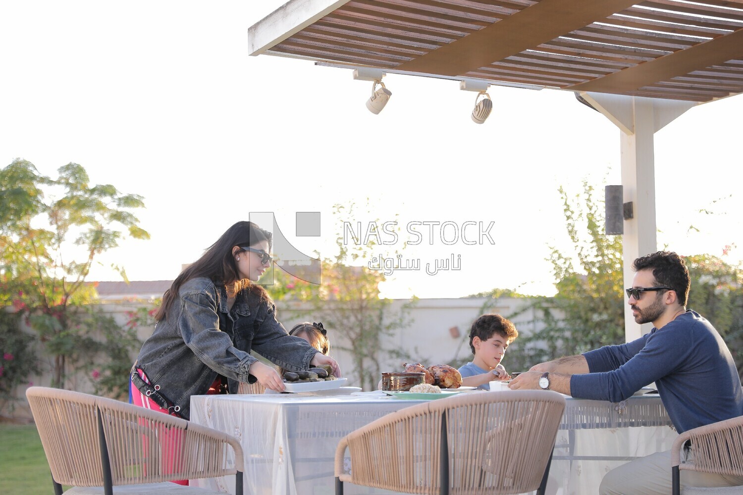 a family eating in the garden