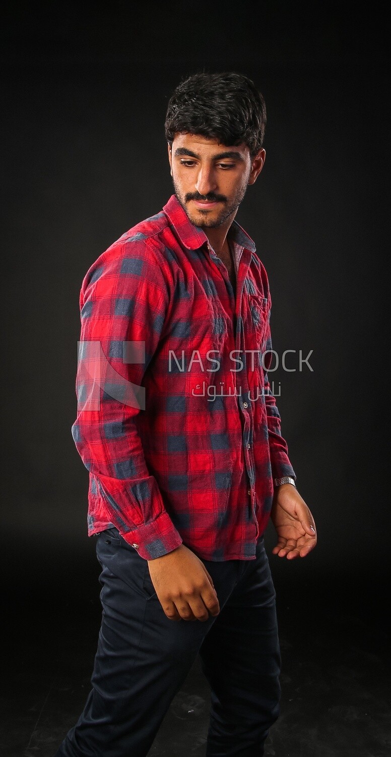 A man wearing casual clothes