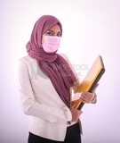 A woman wearing hijab casual clothes