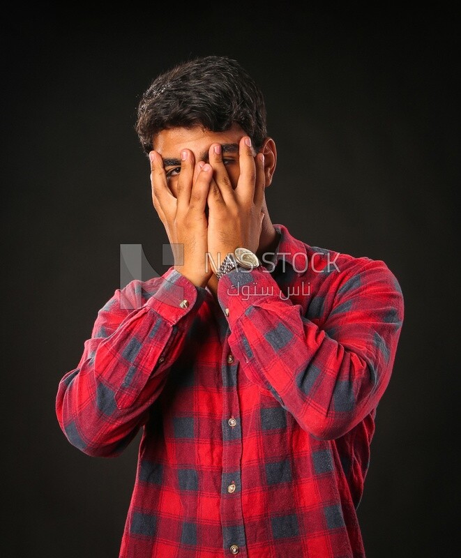 A man wearing casual clothes