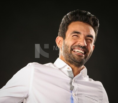 A man wearing casual clothes