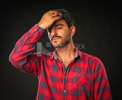 A man wearing casual clothes