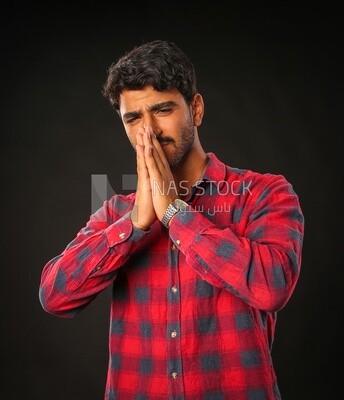 A man wearing casual clothes