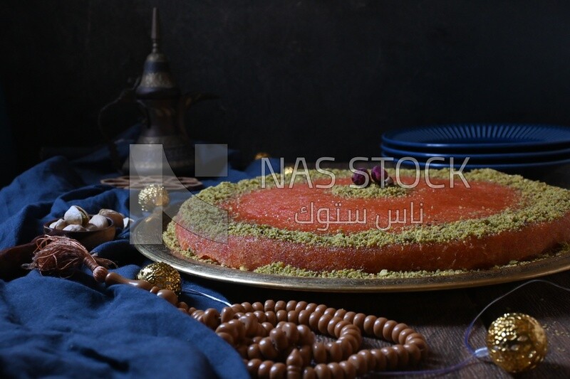 Plate of palestine knafeh with some nuts on it