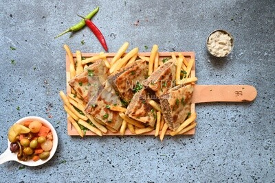 Dish with hawawshi on it with fries