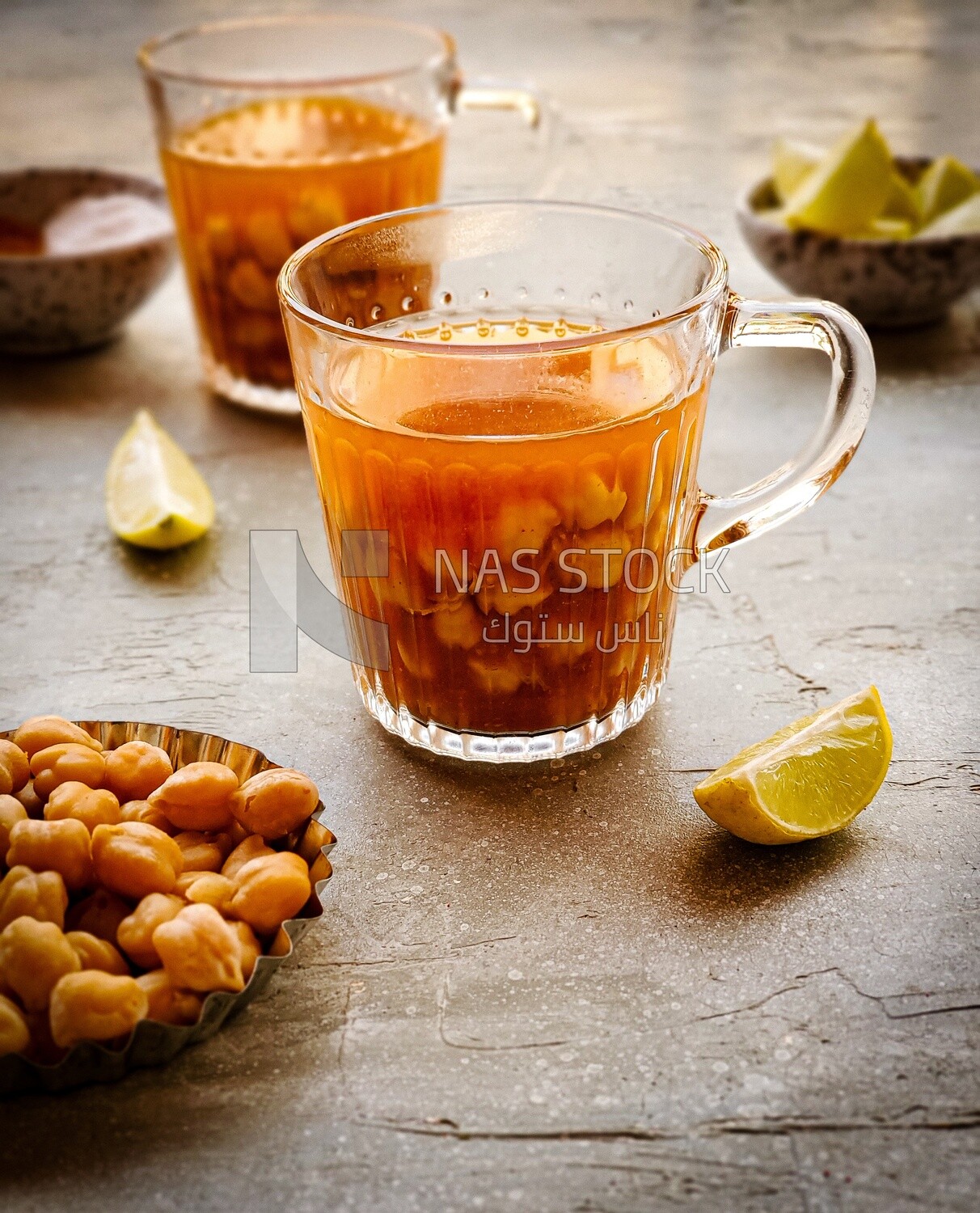 cup of hummus sham with lemon and spices