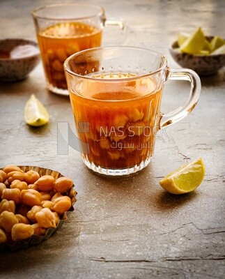 cup of hummus sham with lemon and spices