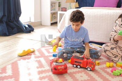 a boy playing in the room