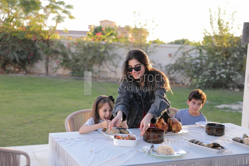 a family eating in the garden