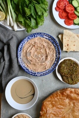 Feeter meshaltet with honey, cheese, and bread