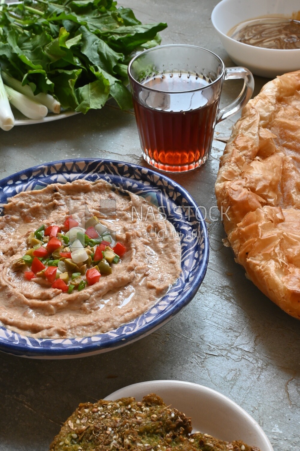 Egyptian breakfast with a cup of tea on the table