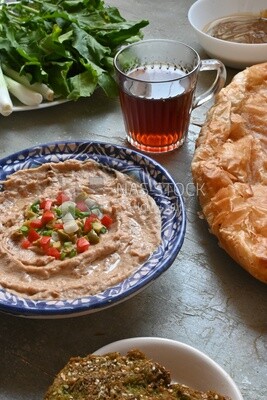 Egyptian breakfast with a cup of tea on the table