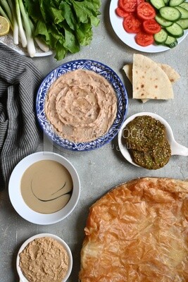 Feeter meshaltet with honey, cheese, and bread