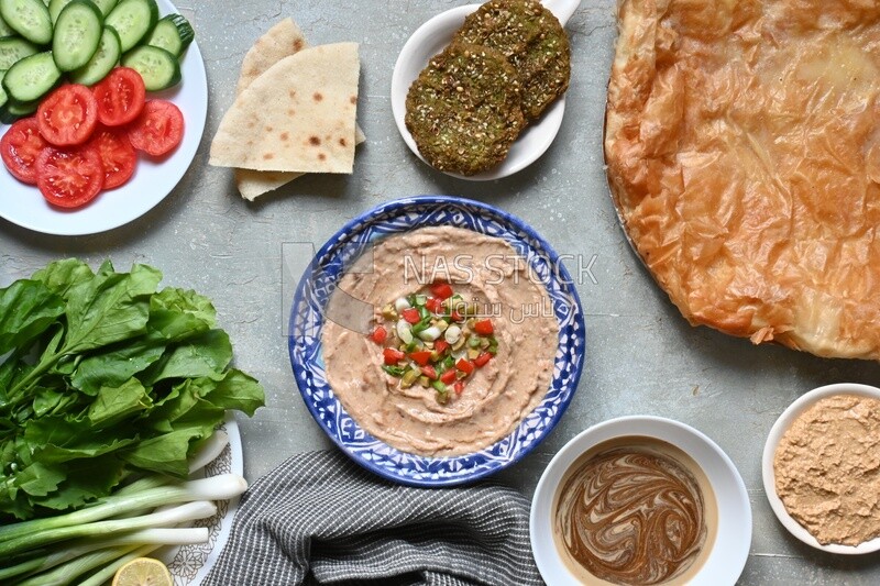 Feeter meshaltet with honey, cheese, and bread