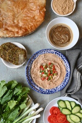 Feeter meshaltet with honey, cheese, and bread