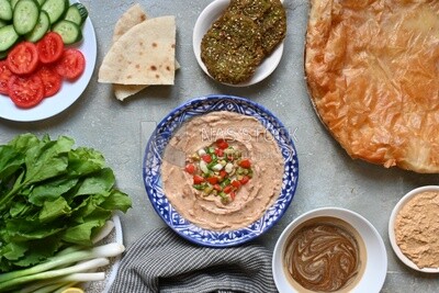 Feeter meshaltet with honey, cheese, and bread