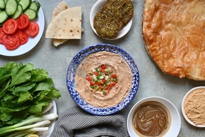Feeter meshaltet with honey, cheese, and bread