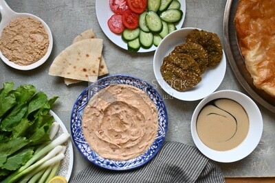 Feeter meshaltet with honey, cheese, and bread