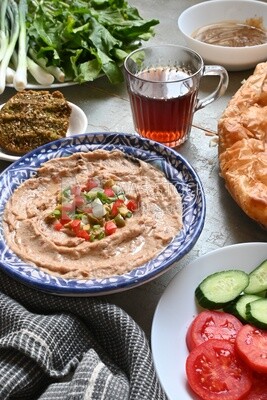 Egyptian breakfast with a cup of tea on the table