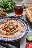 Egyptian breakfast with a cup of tea on the table