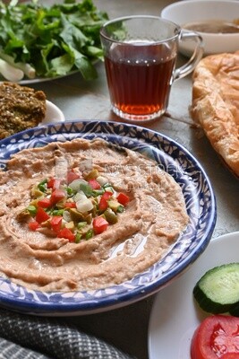 Egyptian breakfast with a cup of tea on the table
