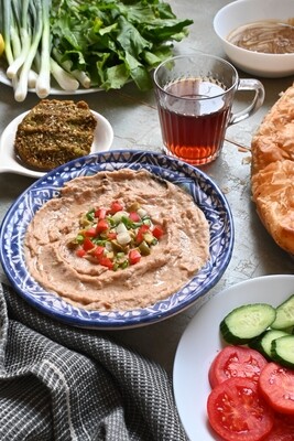 Egyptian breakfast with a cup of tea on the table