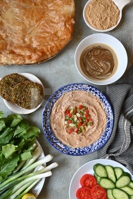 Feeter meshaltet with honey, cheese, and bread