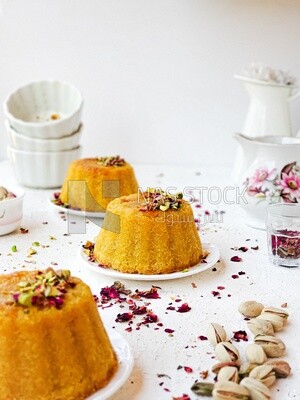 Plate of palestine knafeh with some nuts on it