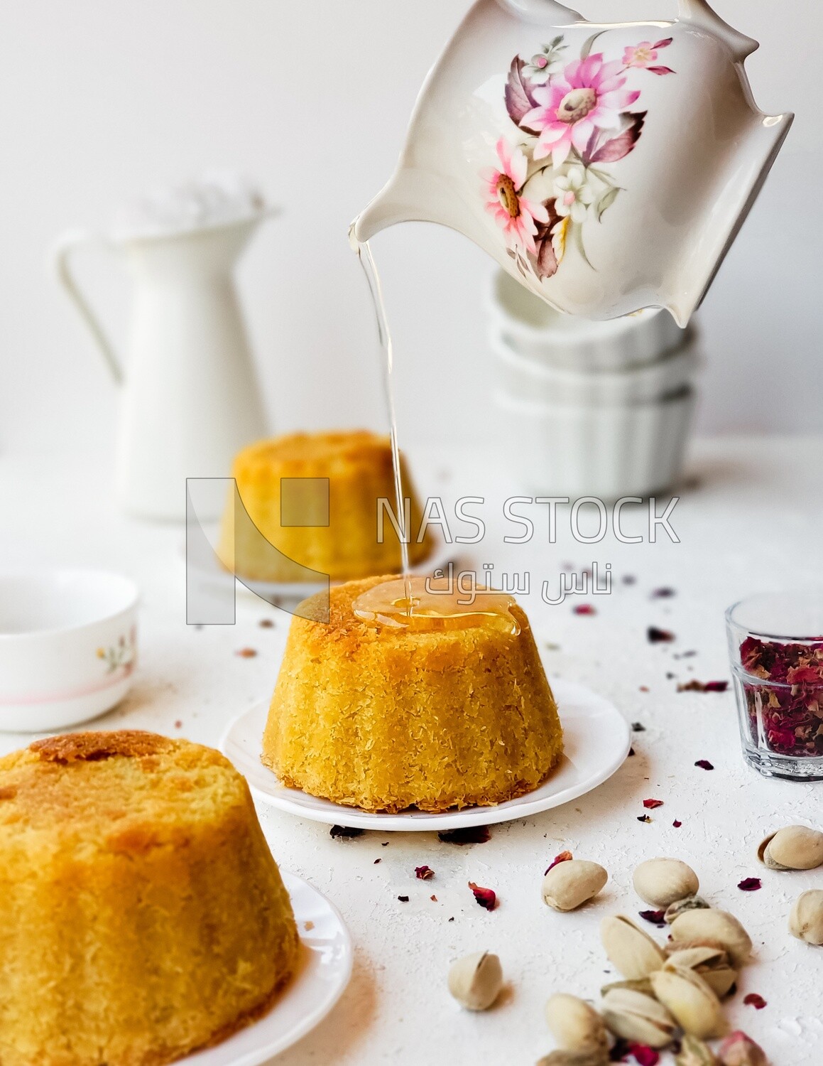 Plate of palestine knafeh with some nuts on it