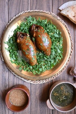 طبق به حمام محشى بجانب شوربة وخبز