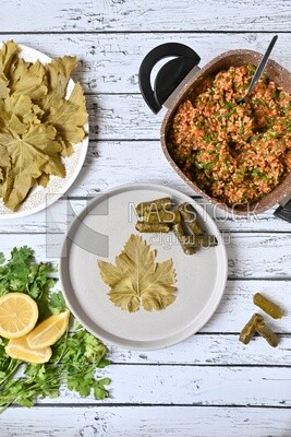 Grape leaves with lemon and ingredients