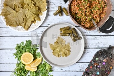 Grape leaves with lemon and ingredients