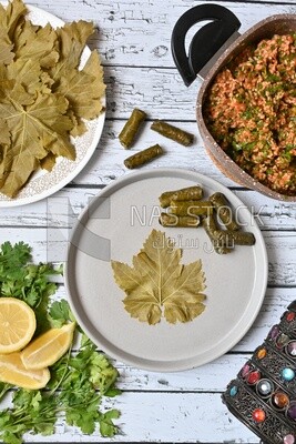 Grape leaves with lemon and ingredients