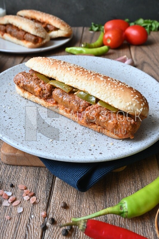 Delicious sausage sandwiches, delicious fast food meals, Arabic restaurants, delicious food recipes, delicious food, sausage sandwich