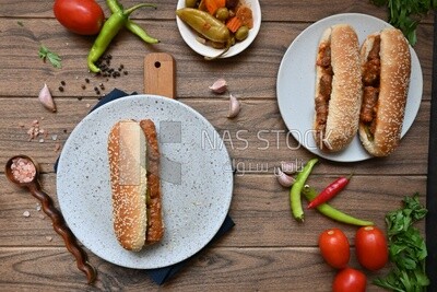 Top view of a delicious sausage sandwich, delicious fast food meals, Arabic restaurants, delicious food recipes, delicious food, sausage sandwich