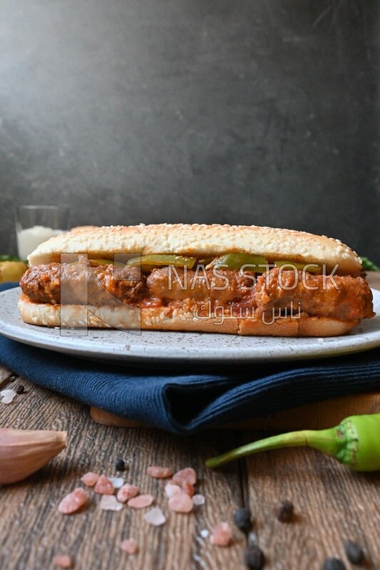 Close up of a delicious sausage sandwich, delicious fast food meals, Arabic restaurants, delicious food recipes, delicious food, sausage sandwich