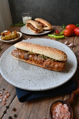Delicious sausage sandwiches, delicious fast food meals, Arabic restaurants, delicious food recipes, delicious food, sausage sandwich