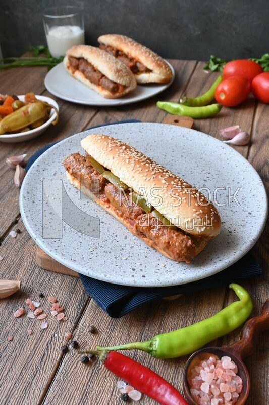 Delicious sausage sandwiches, delicious fast food meals, Arabic restaurants, delicious food recipes, delicious food, sausage sandwich