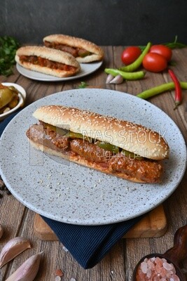 Delicious sausage sandwiches, delicious fast food meals, Arabic restaurants, delicious food recipes, delicious food, sausage sandwich