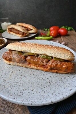 Delicious sausage sandwiches, delicious fast food meals, Arabic restaurants, delicious food recipes, delicious food, sausage sandwich