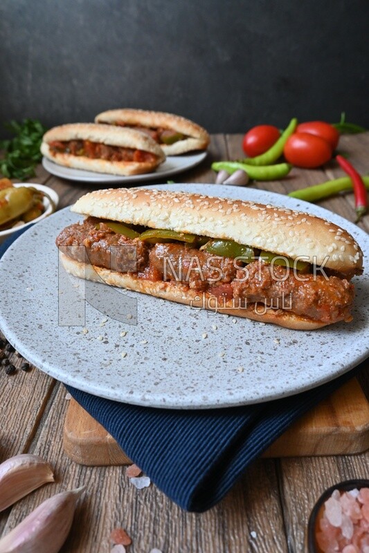 Delicious sausage sandwiches, delicious fast food meals, Arabic restaurants, delicious food recipes, delicious food, sausage sandwich