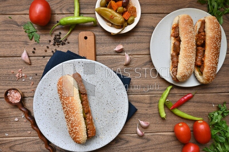 Top view of a delicious sausage sandwich, delicious fast food meals, Arabic restaurants, delicious food recipes, delicious food, sausage sandwich